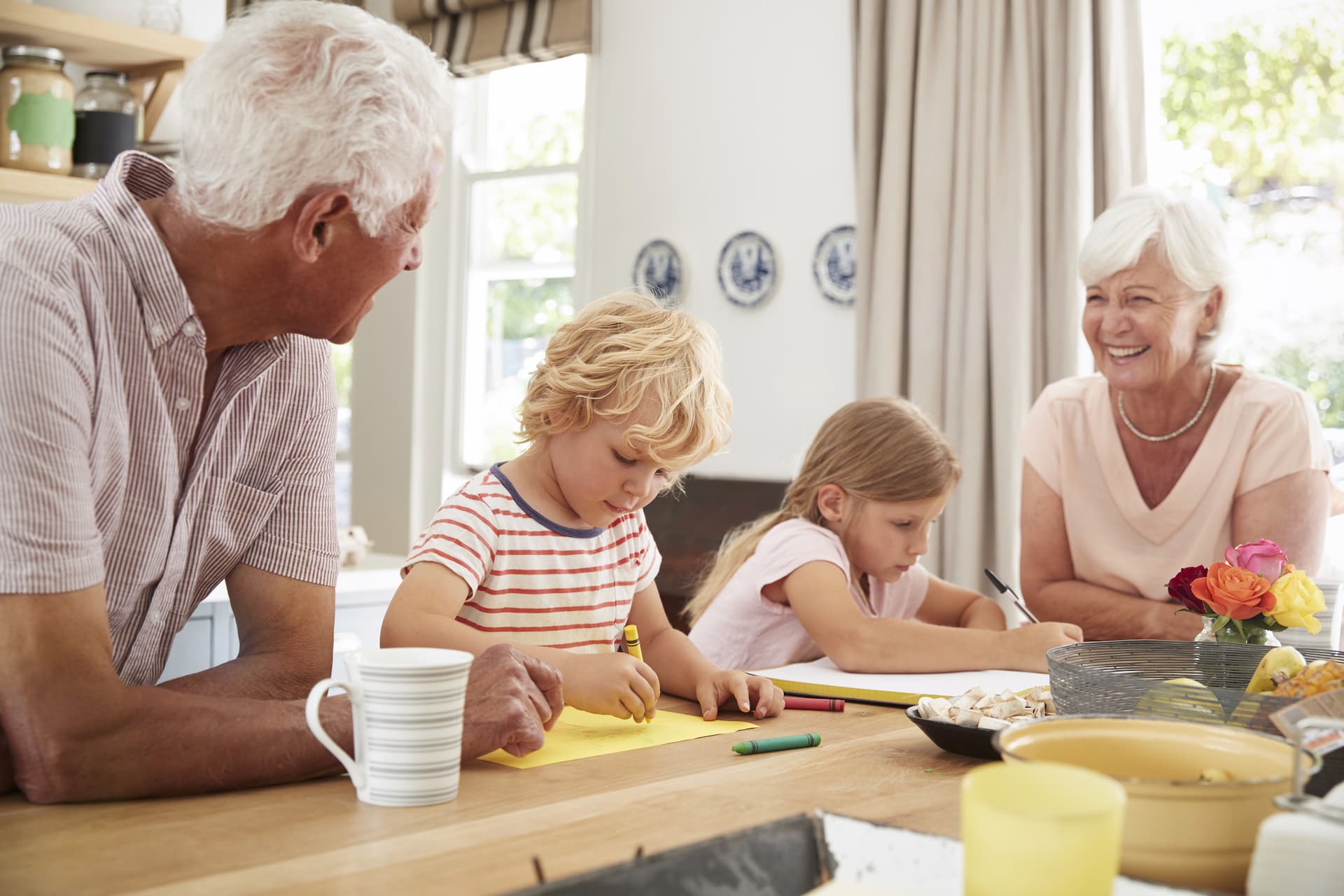 Grand parents with grand children drawing